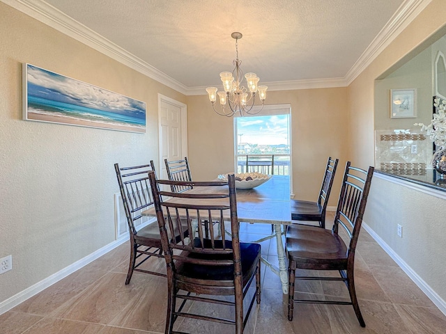 dining space with ornamental molding, a textured ceiling, and an inviting chandelier