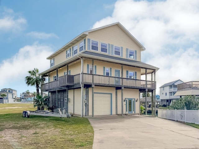 exterior space with a lawn, a garage, and a balcony