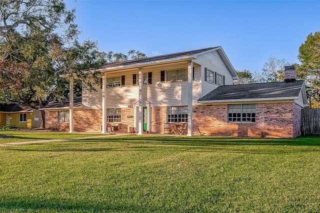 view of front of property with a front lawn