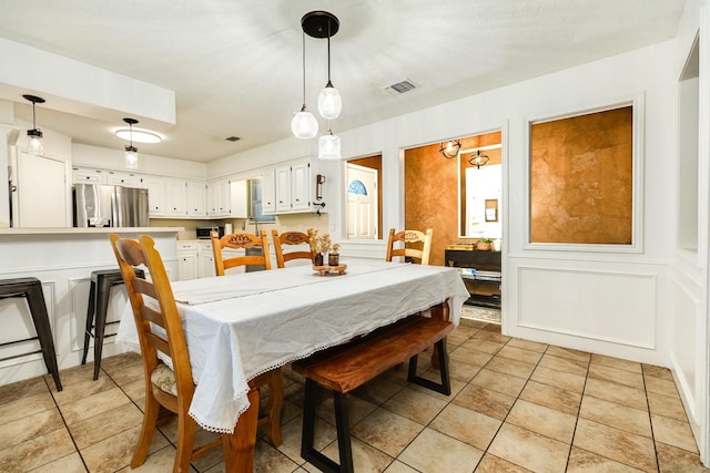 view of tiled dining room