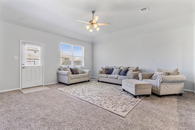 living room with carpet and ceiling fan