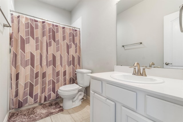 bathroom featuring a shower with shower curtain, vanity, toilet, and tile patterned flooring