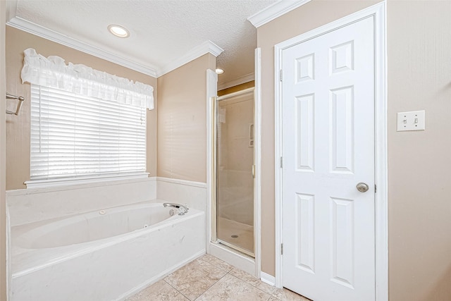 bathroom featuring tile patterned flooring, ornamental molding, plus walk in shower, and a textured ceiling