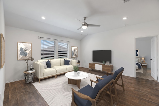 living room featuring dark hardwood / wood-style floors, ceiling fan, and vaulted ceiling