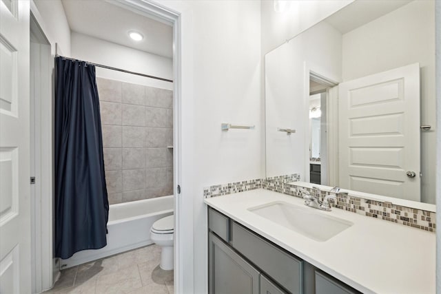 full bathroom featuring decorative backsplash, vanity, toilet, and shower / bathtub combination with curtain