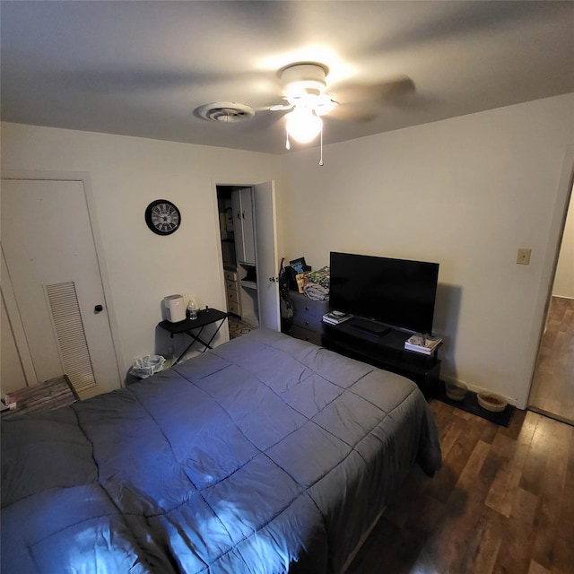 bedroom featuring wood-type flooring and ceiling fan