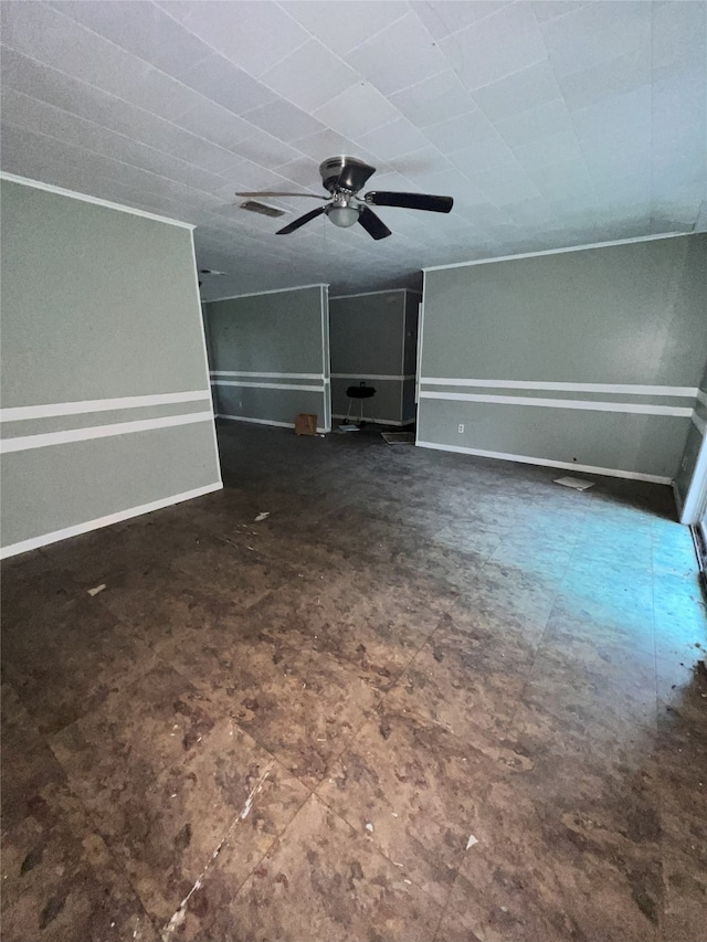 903 US Highway 190 W, Jasper, TX 75951 - unfurnished living room featuring baseboards and a ceiling fan