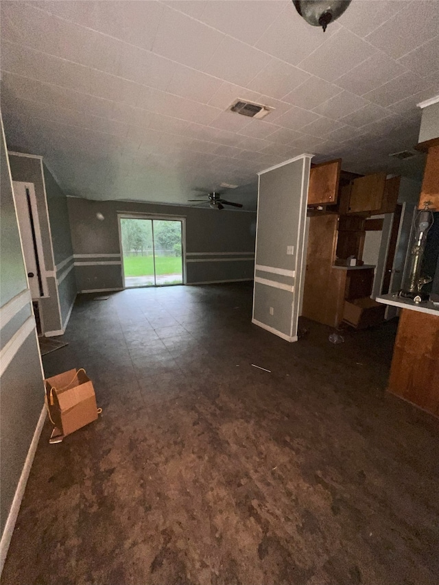 903 US Highway 190 W, Jasper, TX 75951 - unfurnished living room with ceiling fan and baseboards