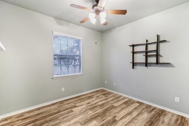 unfurnished room featuring ceiling fan and light hardwood / wood-style floors