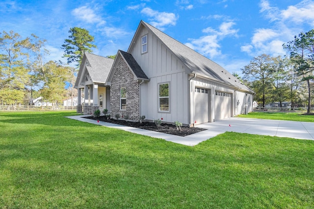 view of property exterior with a yard and a garage