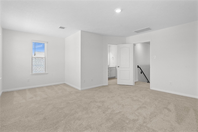 2836 Shimmer Edge Dr, Katy, TX 77493 - empty room featuring baseboards, light carpet, and visible vents