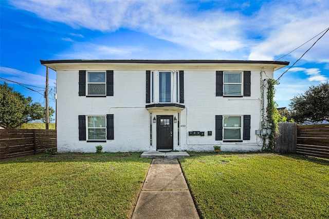 view of front of property with a front yard