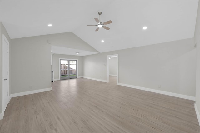 empty room featuring ceiling fan, high vaulted ceiling, and light hardwood / wood-style floors