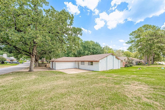 exterior space featuring a front lawn