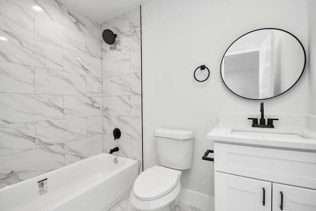 full bathroom featuring vanity, tiled shower / bath combo, and toilet