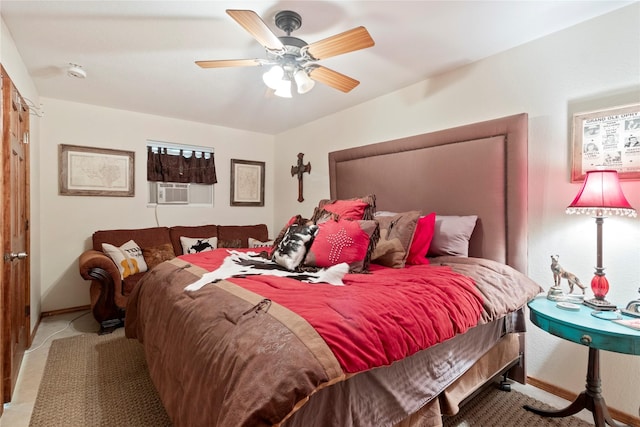 bedroom with ceiling fan and cooling unit