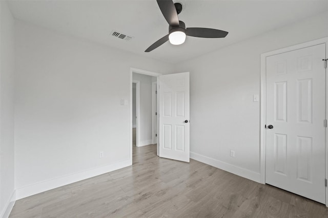 unfurnished bedroom featuring light hardwood / wood-style floors and ceiling fan