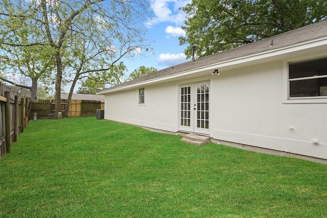 view of yard with french doors