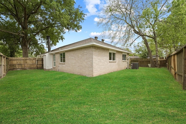 view of yard with central AC unit