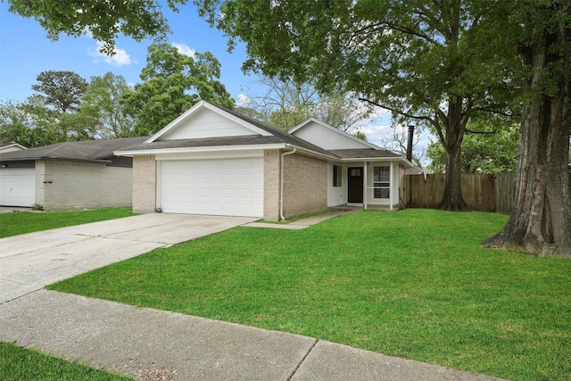 single story home featuring a front lawn and a garage