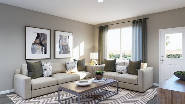 living room featuring wood-type flooring and a wealth of natural light