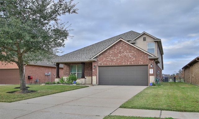 view of front of property with central AC unit, a garage, and a front lawn