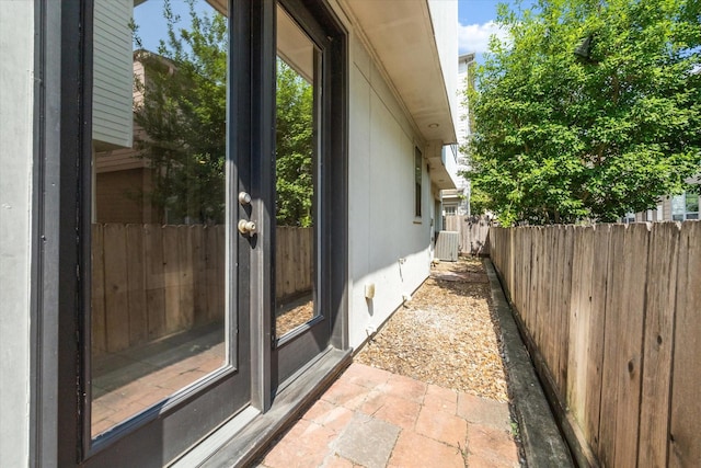 view of property exterior featuring fence