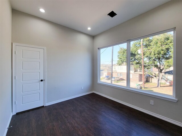 empty room featuring dark hardwood / wood-style floors