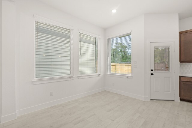 empty room featuring light hardwood / wood-style floors