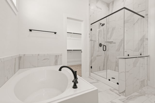 bathroom with independent shower and bath