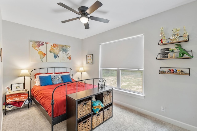 bedroom featuring ceiling fan and carpet floors