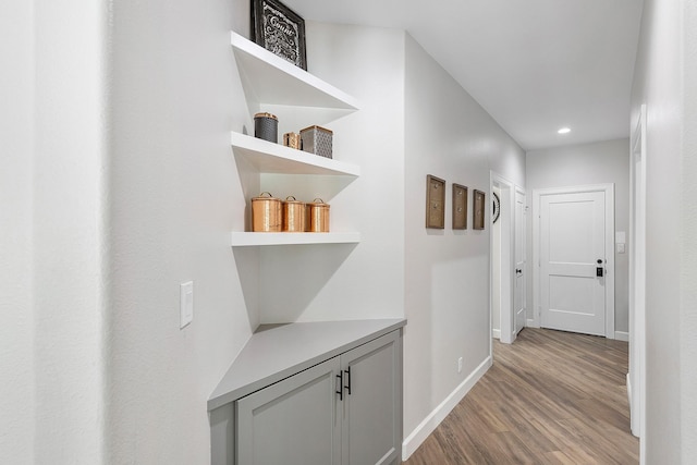 hallway featuring light wood-type flooring