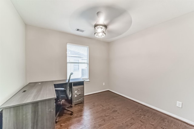 unfurnished office featuring dark wood-type flooring