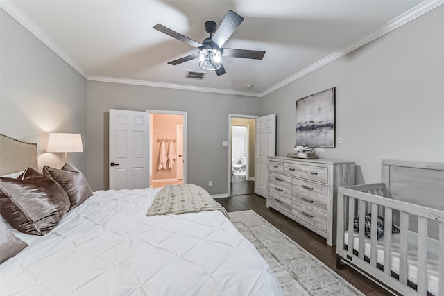 bedroom featuring dark hardwood / wood-style flooring, connected bathroom, ceiling fan, and ornamental molding