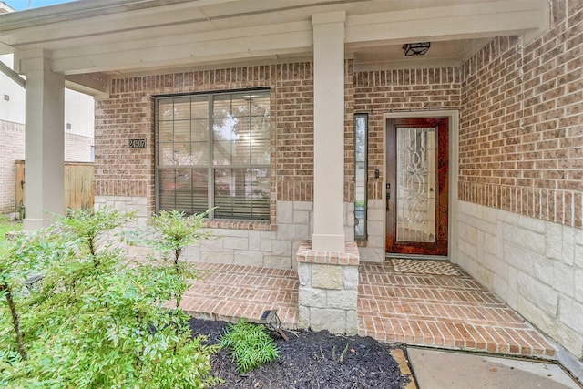 property entrance featuring covered porch