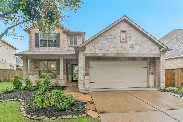 view of front of house with a porch and a garage