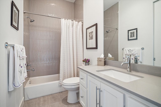 full bathroom with tile patterned flooring, vanity, shower / bath combo, and toilet