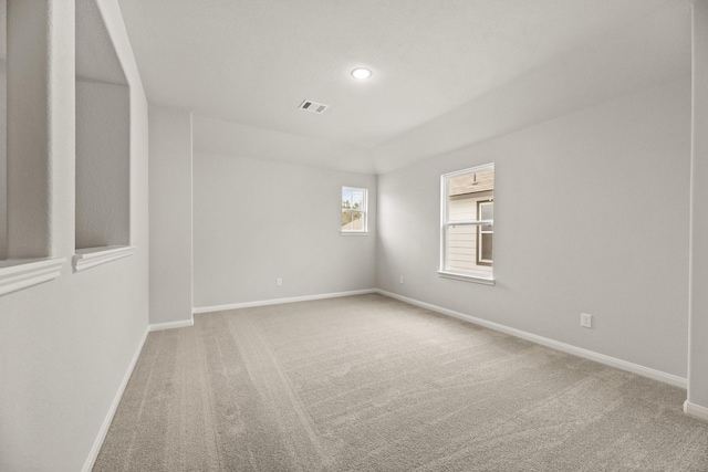 unfurnished room featuring carpet floors