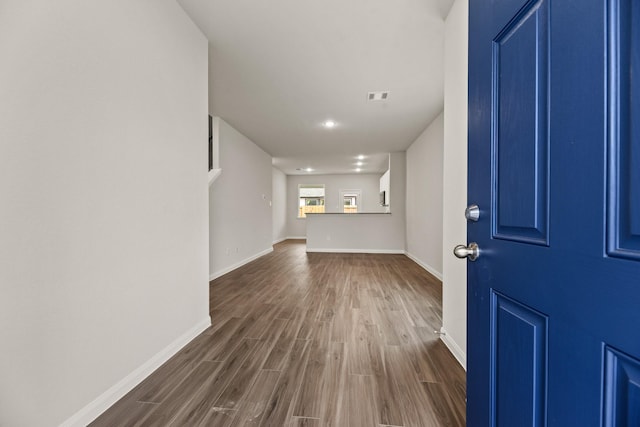 foyer entrance featuring dark hardwood / wood-style flooring