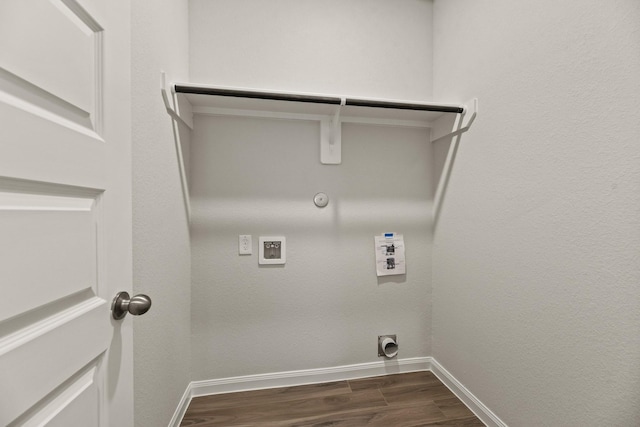 washroom featuring dark hardwood / wood-style floors, gas dryer hookup, and hookup for a washing machine