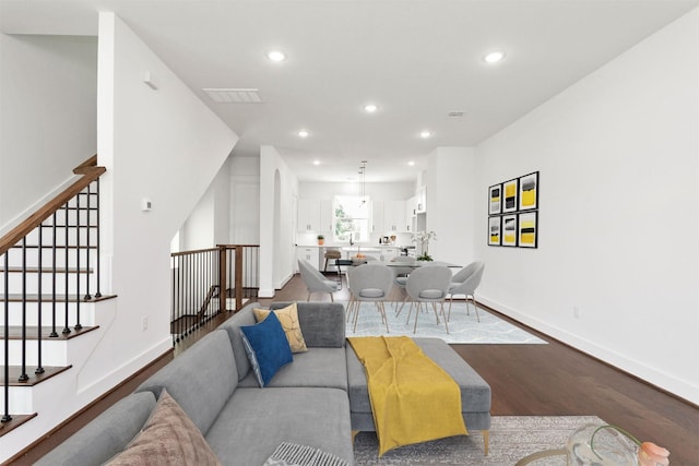 living room featuring wood-type flooring