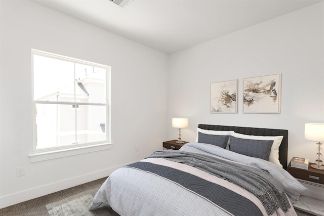 bedroom featuring carpet