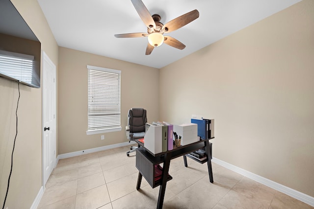 office area featuring light tile patterned floors and ceiling fan