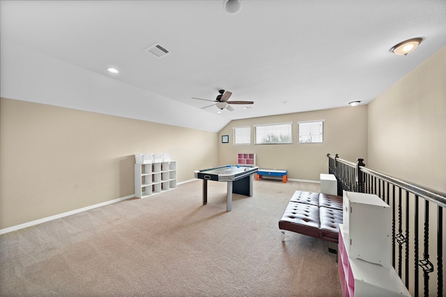 playroom with carpet, ceiling fan, and lofted ceiling