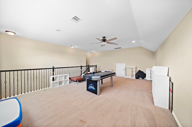 playroom featuring light carpet, vaulted ceiling, and ceiling fan