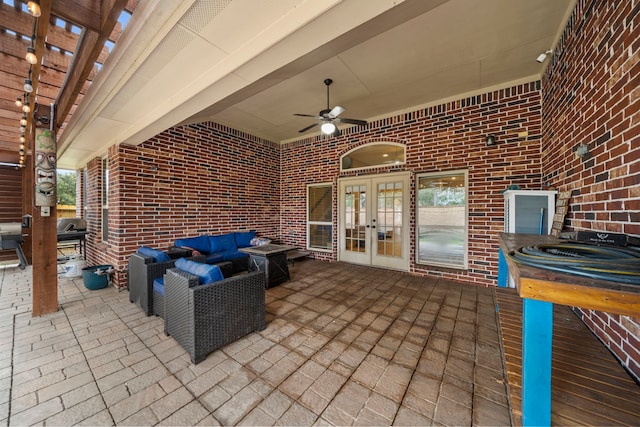 view of patio / terrace with an outdoor living space, french doors, and ceiling fan