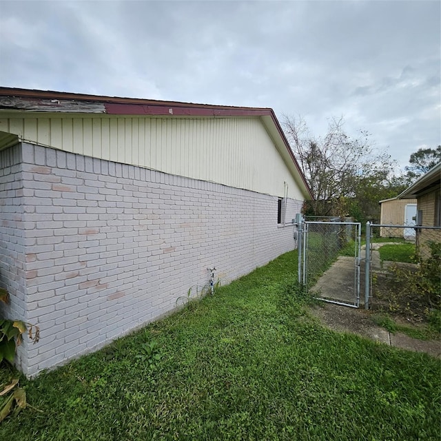 view of home's exterior featuring a lawn