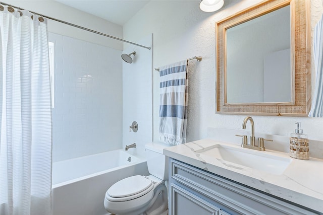 full bathroom with shower / tub combo, vanity, and toilet