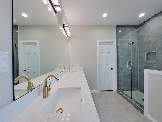 bathroom featuring vanity and walk in shower