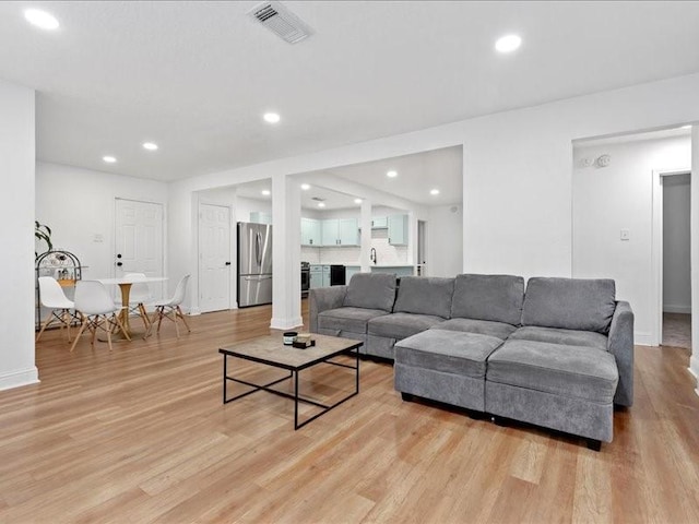 living room with light wood-type flooring